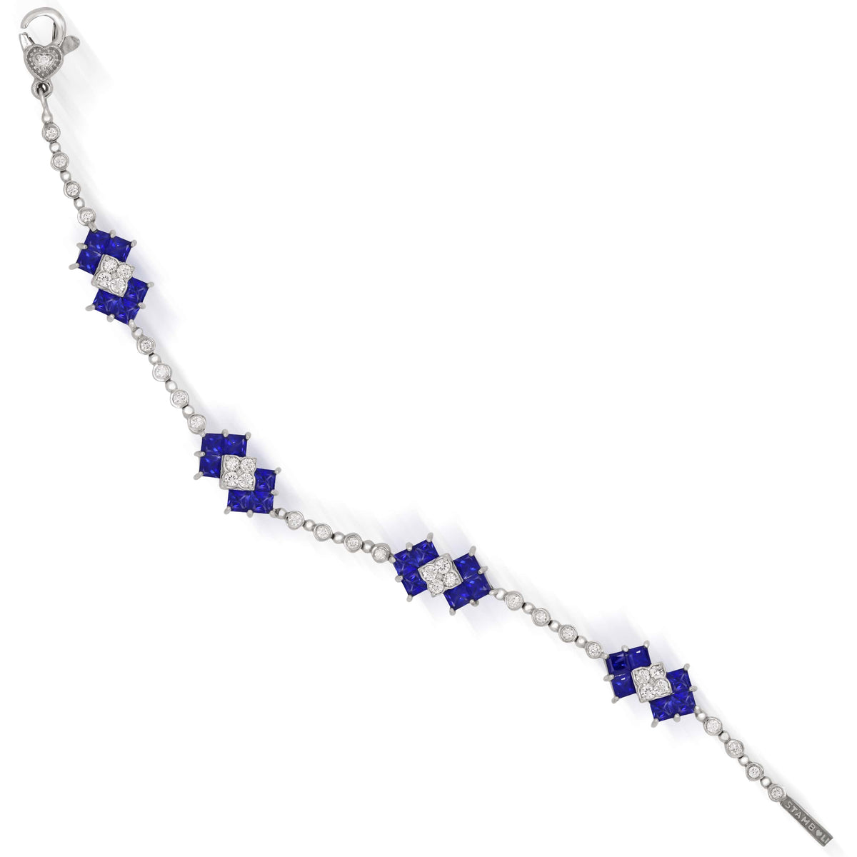 Blue sapphire and diamond bracelet in 18K white gold with princess cut stations, top-down view with clasp