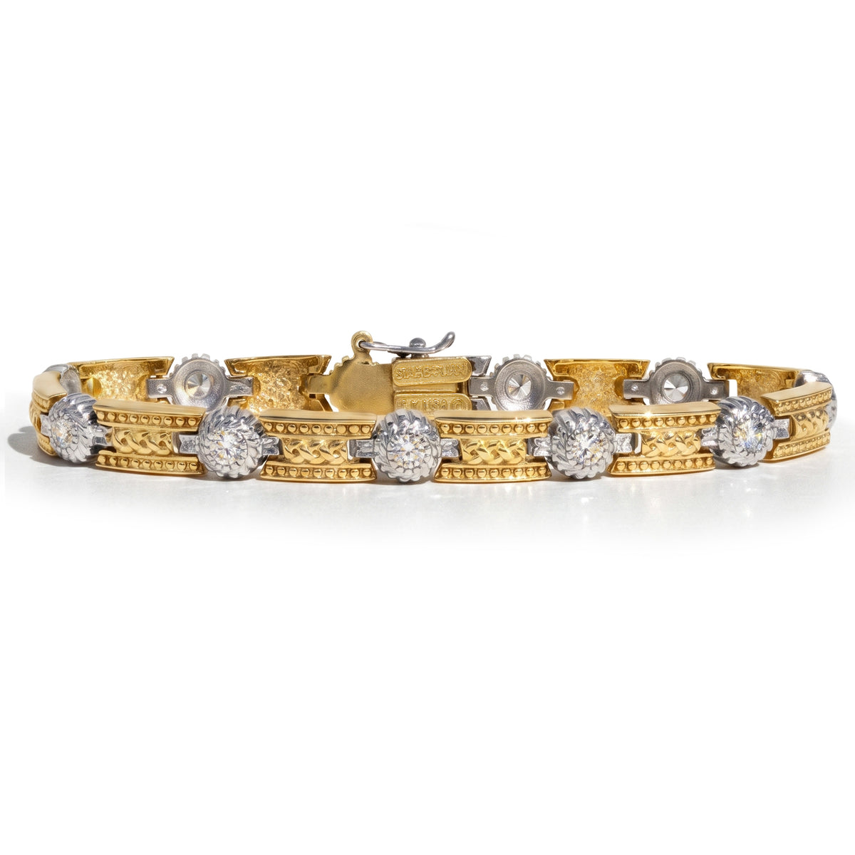 "Happiness" bezel set diamond bracelet in 18K yellow and white gold, front view with clasp