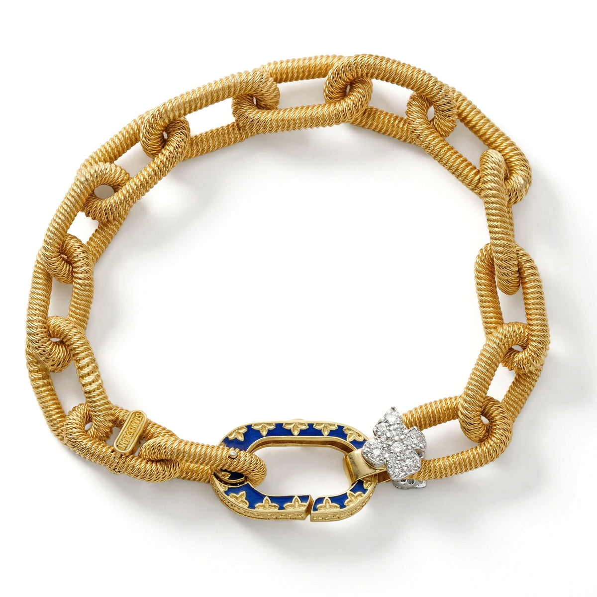 18K yellow gold link bracelet with cobalt blue enamel clasp and diamond flower, top-down view