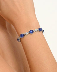 18K WHITE GOLD AND DIAMOND BRACELET WITH CABOCHON TANZANITES