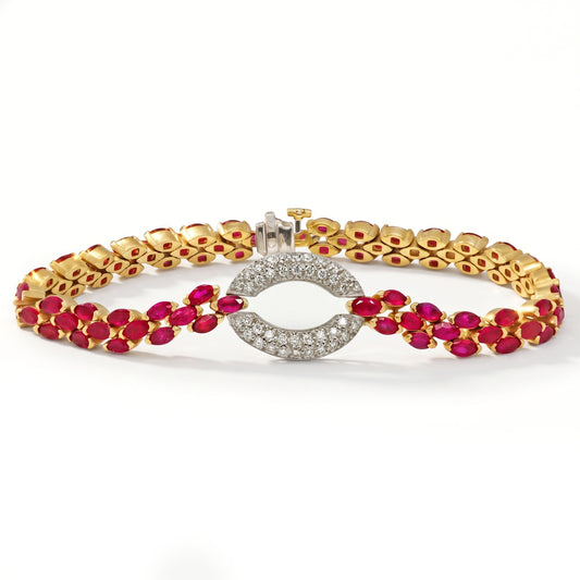18K gold bracelet with marquise rubies and a diamond pavé oval center, front view of the full bracelet
