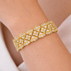 Stambolian Passion 18K Gold Pavé Diamond Quatrefoil Bracelet Studio View Curved in Circle