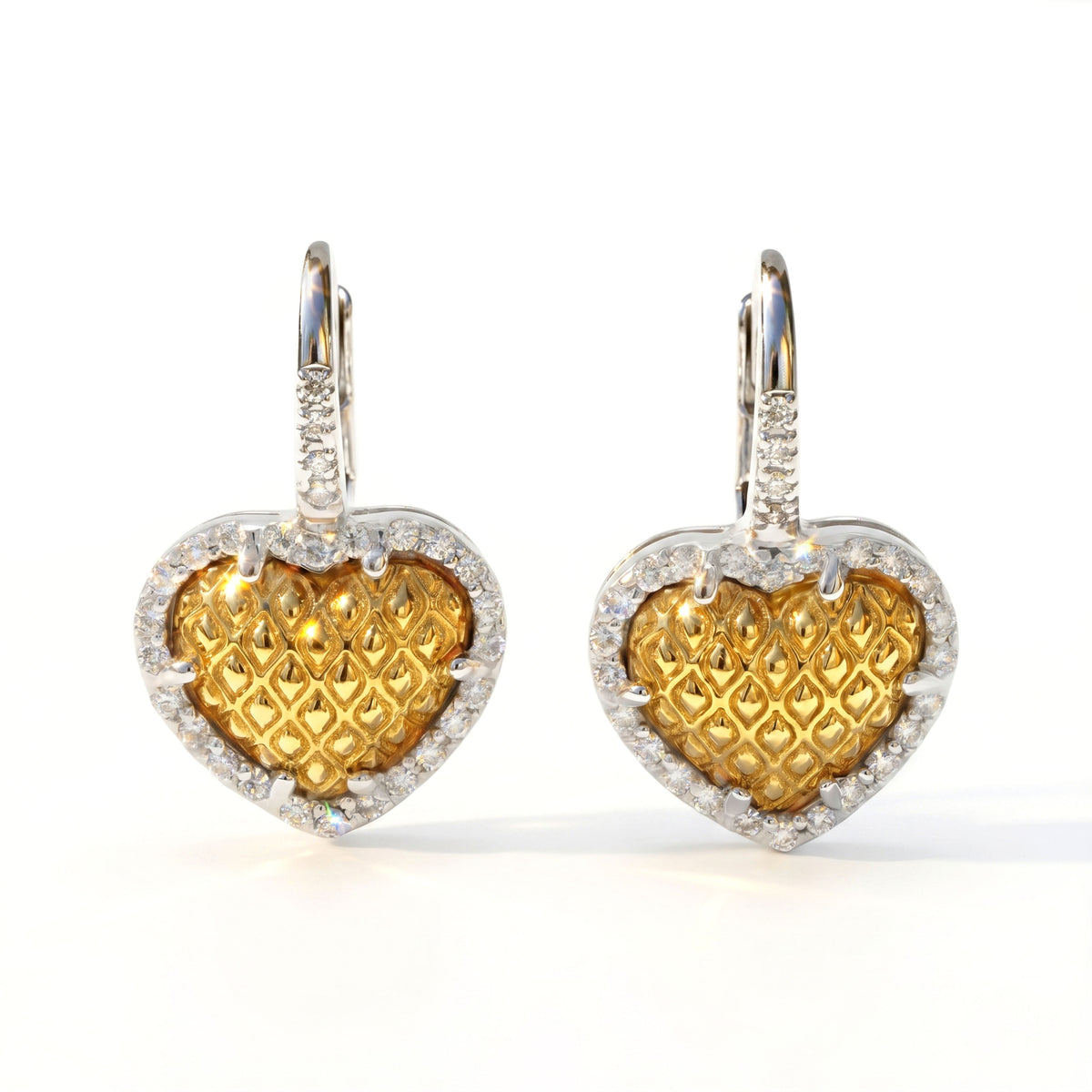"Everything Hearts" diamond heart lever back earrings in 18K two-tone gold, pair shown together