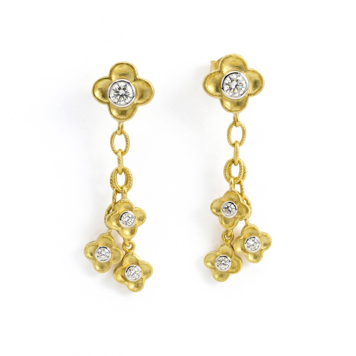 "Mayflower" dangling diamond flower earrings in 18K gold, front view of the pair