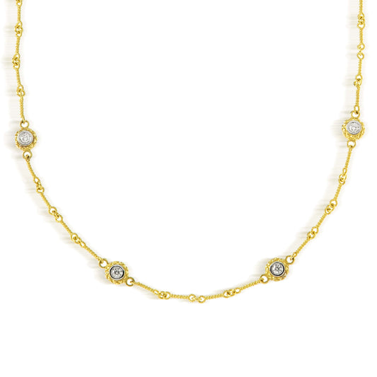 18K yellow gold four double sided diamond bezel chain necklace, close-up of the diamond stations
