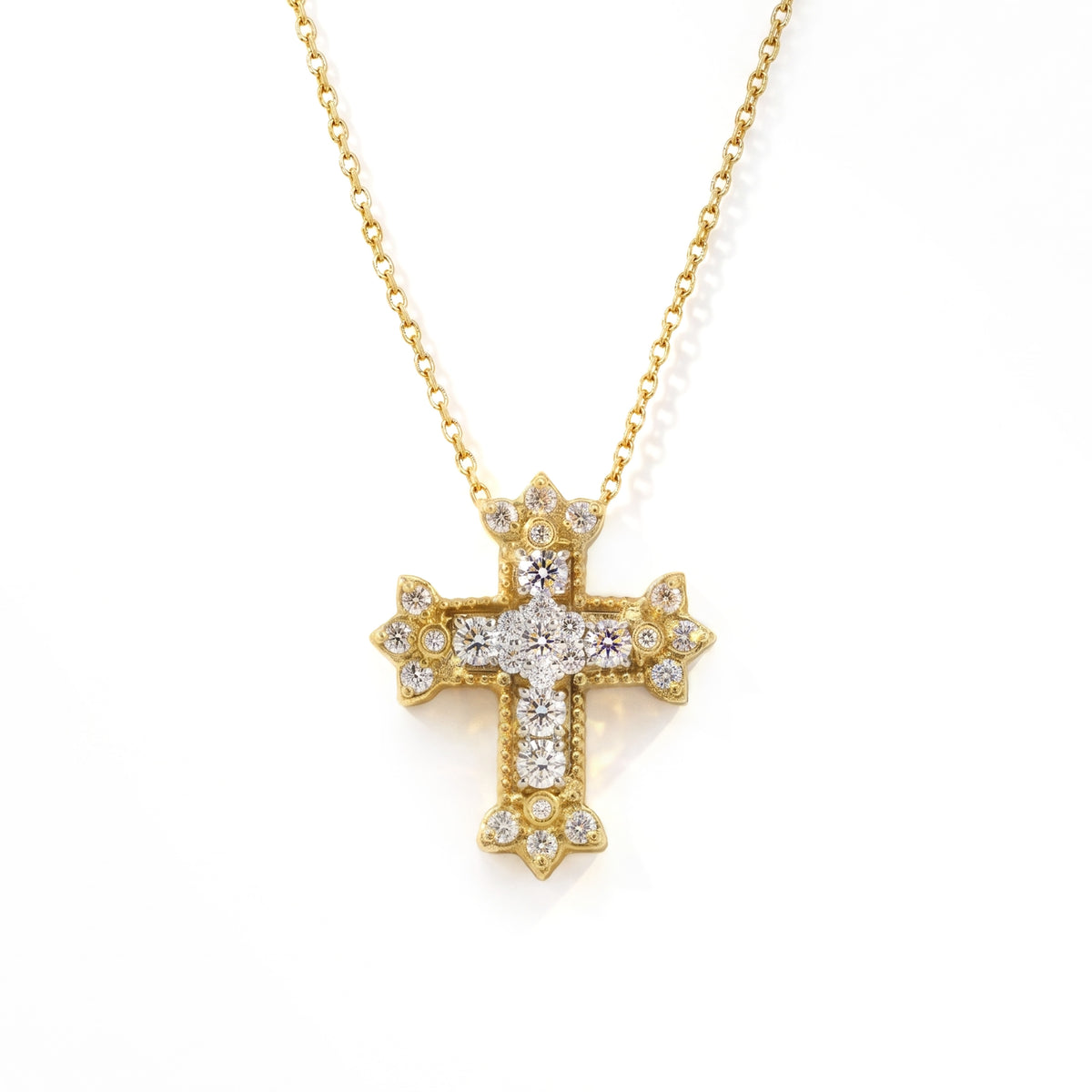 Two-tone 18K gold and diamond cross pendant on a gold chain, front view