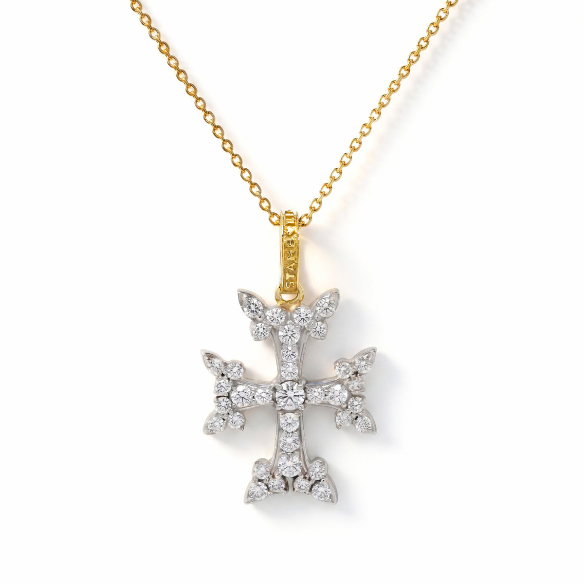Double sided Armenian cross pendant in 18K two-tone gold with diamonds, shown with its chain