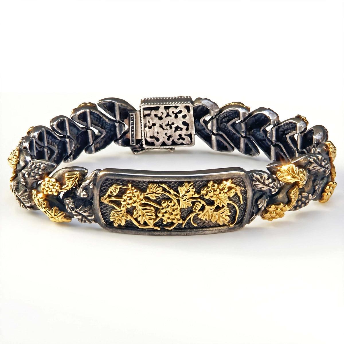 "Napa Valley" grape vine link bracelet in aged silver and 18K gold, front view of the vine plaque and clasp