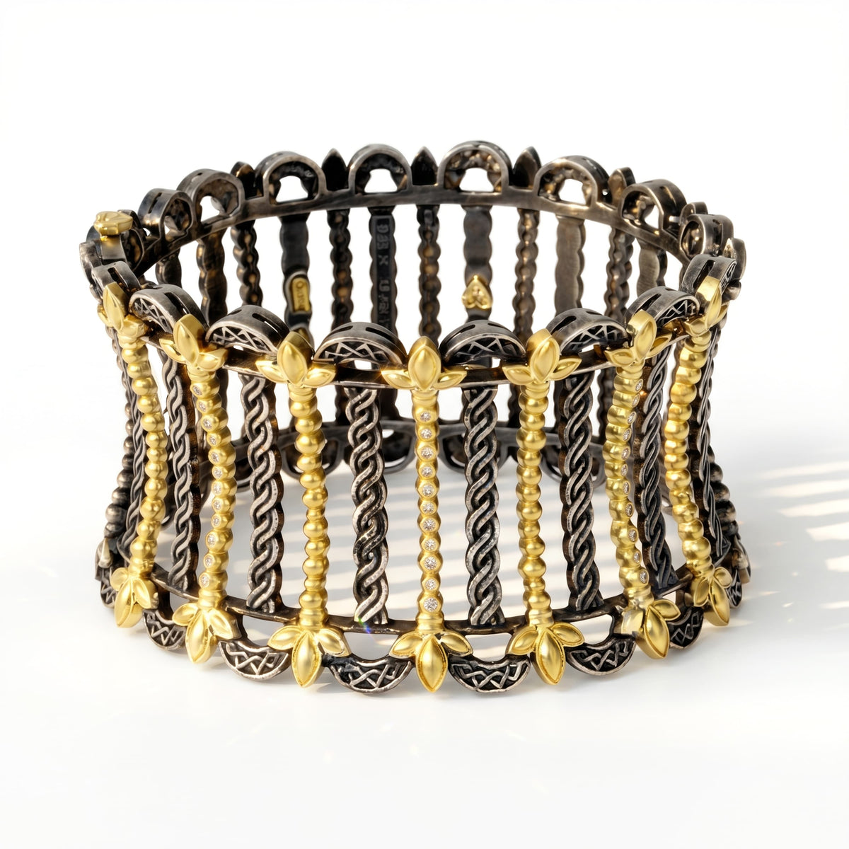 "Cleopatra" aged silver and 18K gold cuff bracelet with diamonds and gold fleur motifs, front view