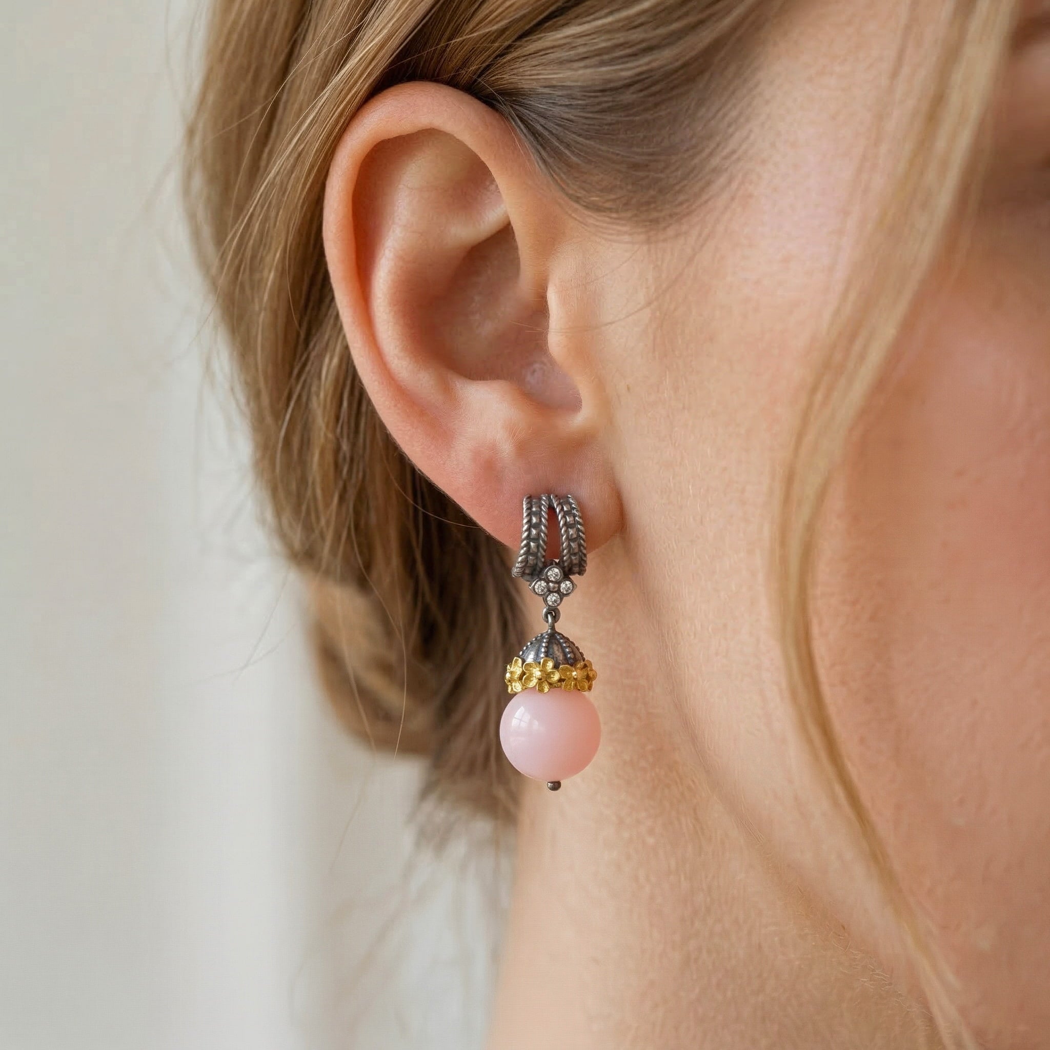 Model Wearing Stambolian Beginnings Pink Opal Drop Earrings Showing Scale and Movement