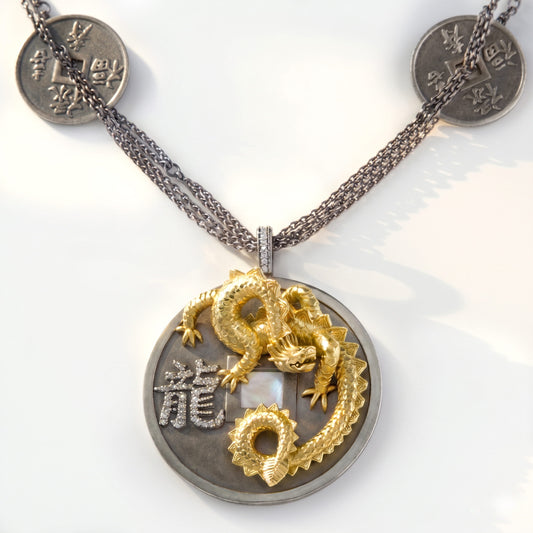 "Year of the Dragon" aged silver and 18K gold diamond pendant necklace with lucky coins, close-up of the pendant