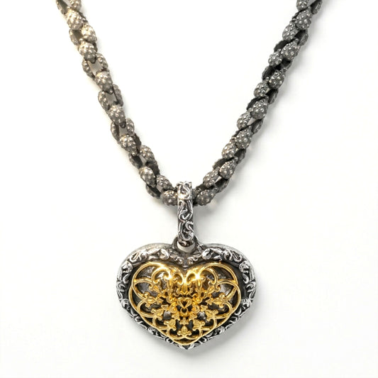 Beginnings aged silver and 18K gold heart enhancer pendant with gold filigree center, shown with its chain