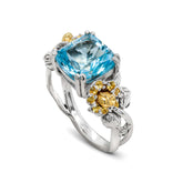 BLOSSOM BLUE TOPAZ YELLOW SAPPHIRE AGED SILVER 18K GOLD FLORAL RING