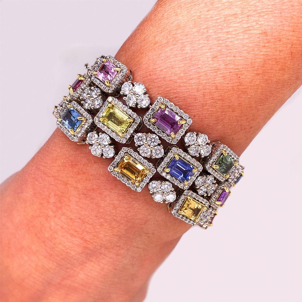 One of a Kind no heat multi-color sapphire and diamond three-row bracelet in 18K gold, worn on the wrist