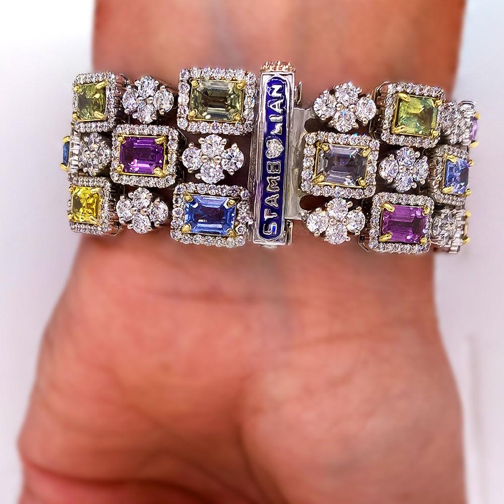One of a Kind no heat multi-color sapphire and diamond bracelet in 18K gold, worn on the wrist with enamel clasp