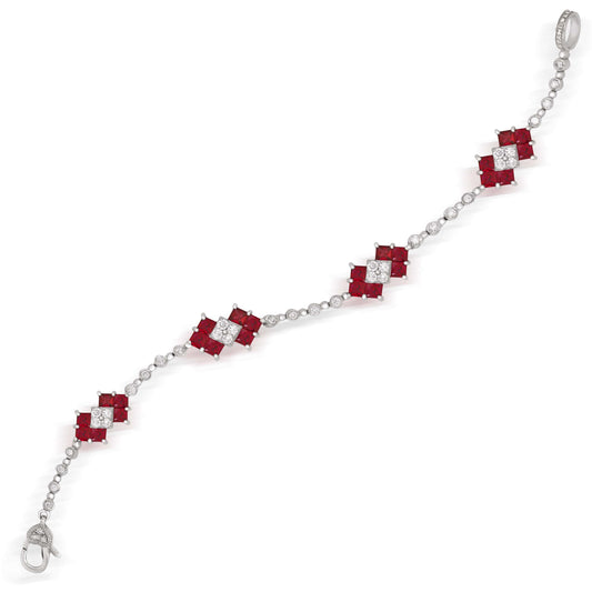 Princess cut ruby and diamond bracelet in 18K white gold, top-down view with clasp