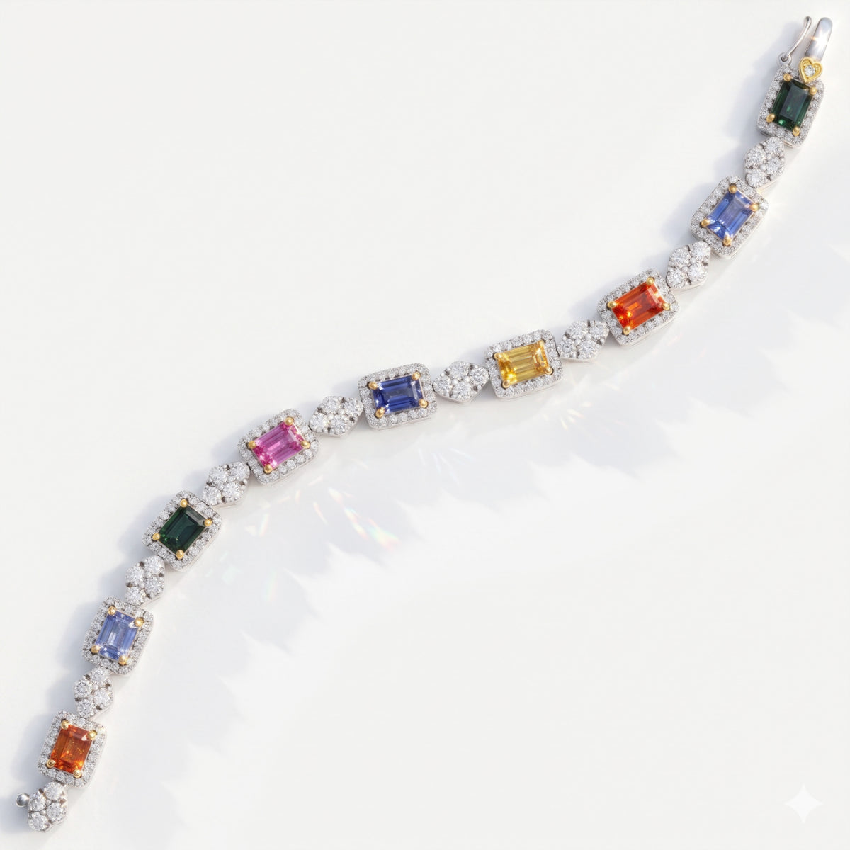 One of a kind multi color sapphire and diamond bracelet in 18K white gold, top-down view laid out