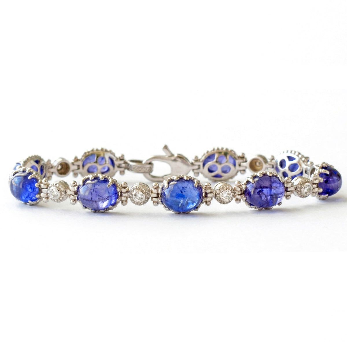 Happiness tanzanite and diamond bracelet in 18K white gold, front view with clasp