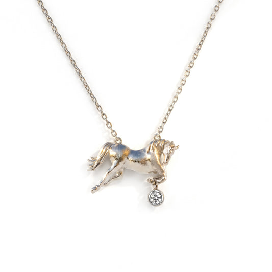 18K white gold and diamond equestrian horse charm pendant on a chain, front view