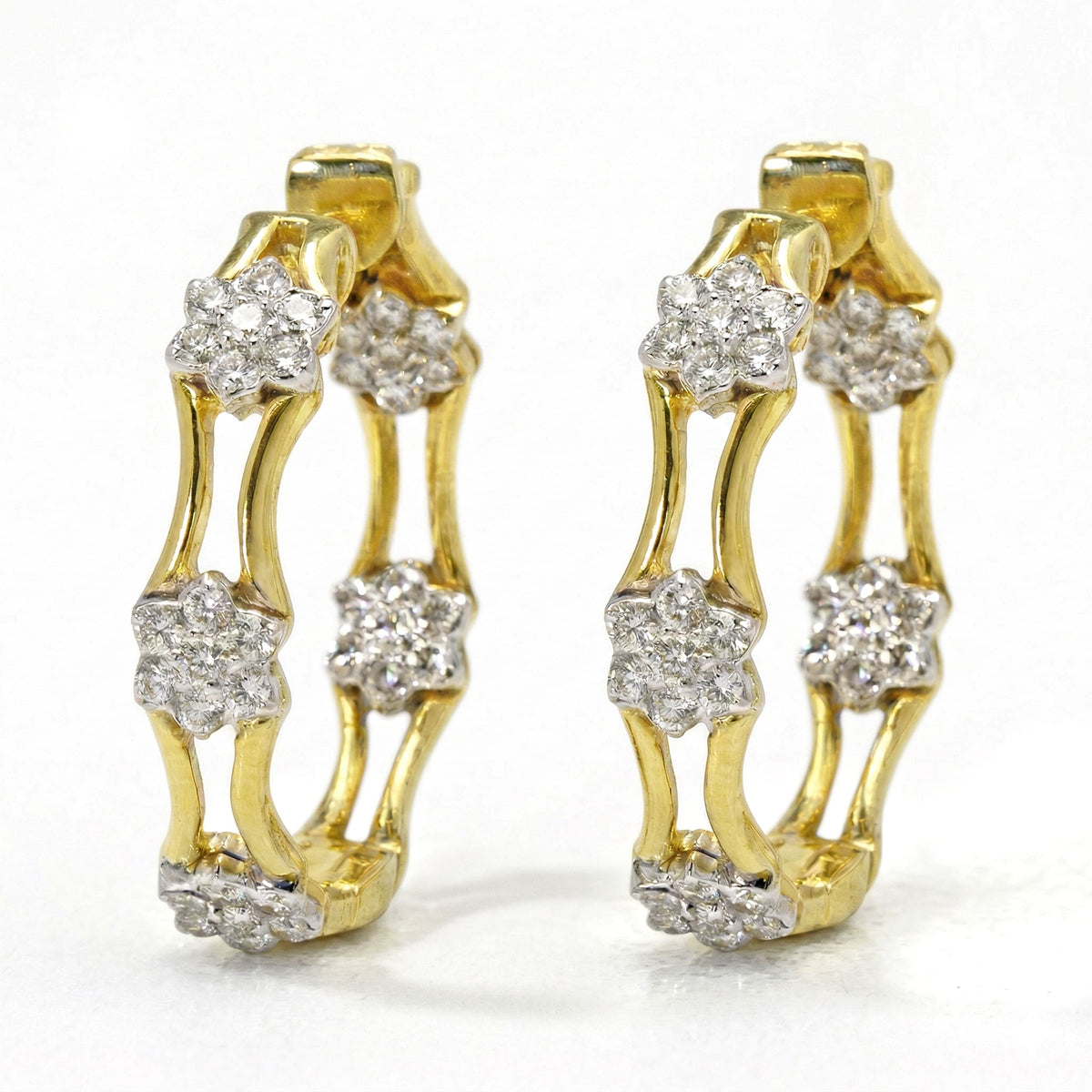 "Happiness" inside out diamond cluster hoop earrings in 18K two tone gold, pair shown together, front view