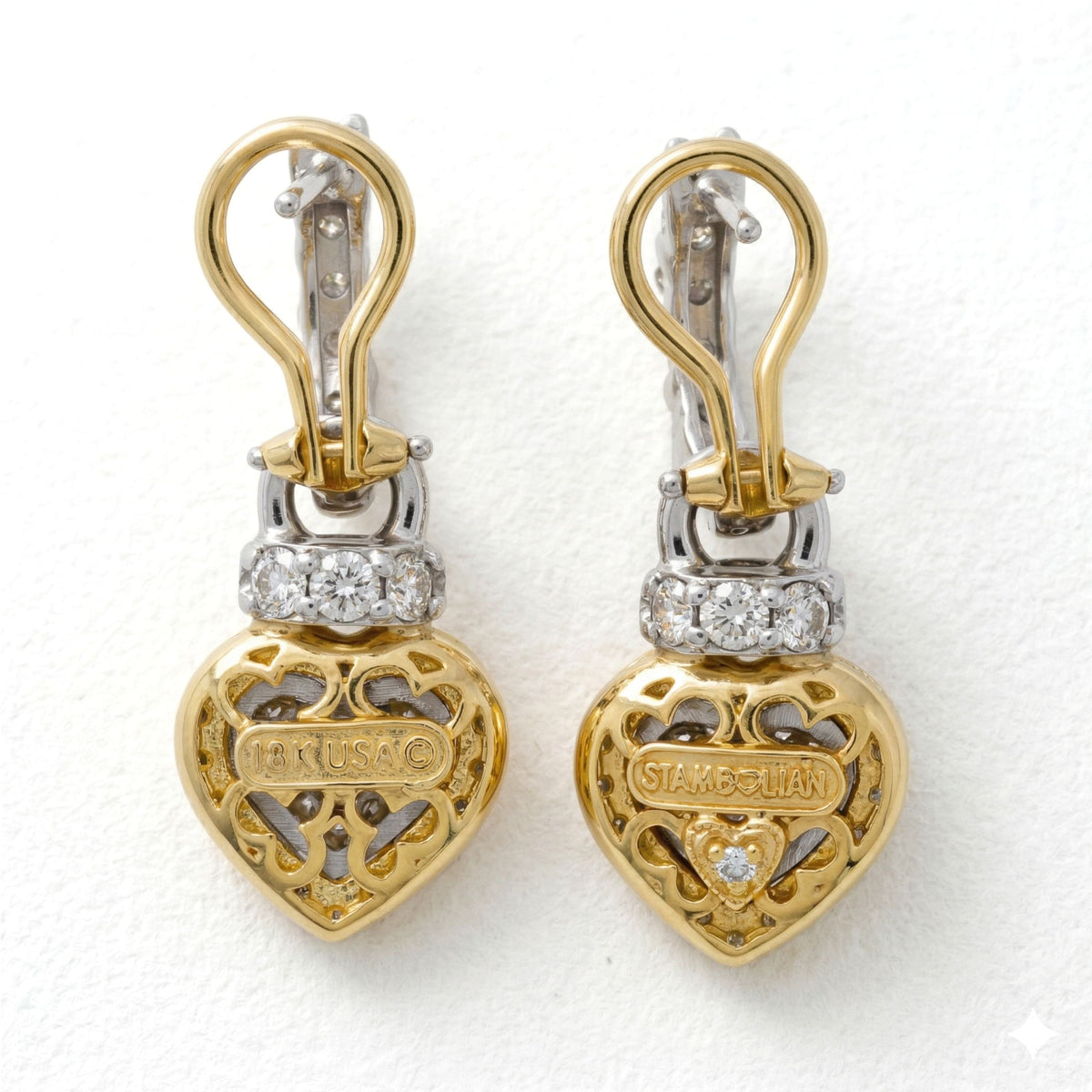 "Everything Hearts" 18K two-tone gold diamond heart earrings, back view showing the signature diamond heart