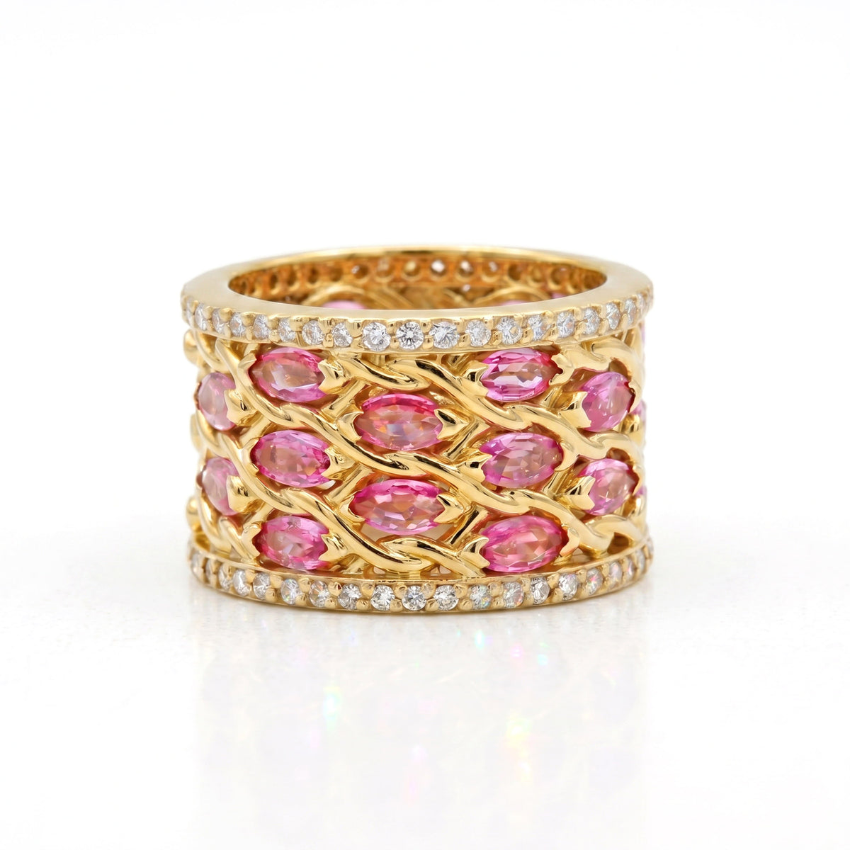 "Ambition" 18K yellow gold band ring with pink sapphires and diamond edges, front view