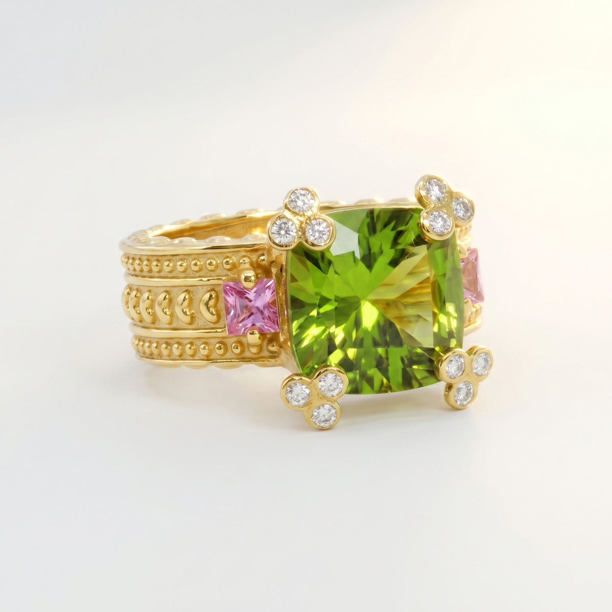 Happiness 18K gold peridot, pink sapphire and diamond ring with heart-textured band, front view