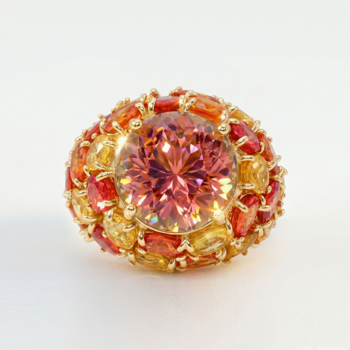 Color changing tourmaline ring with multi color sapphires and rubies in 18K gold, top-down view of the center stone