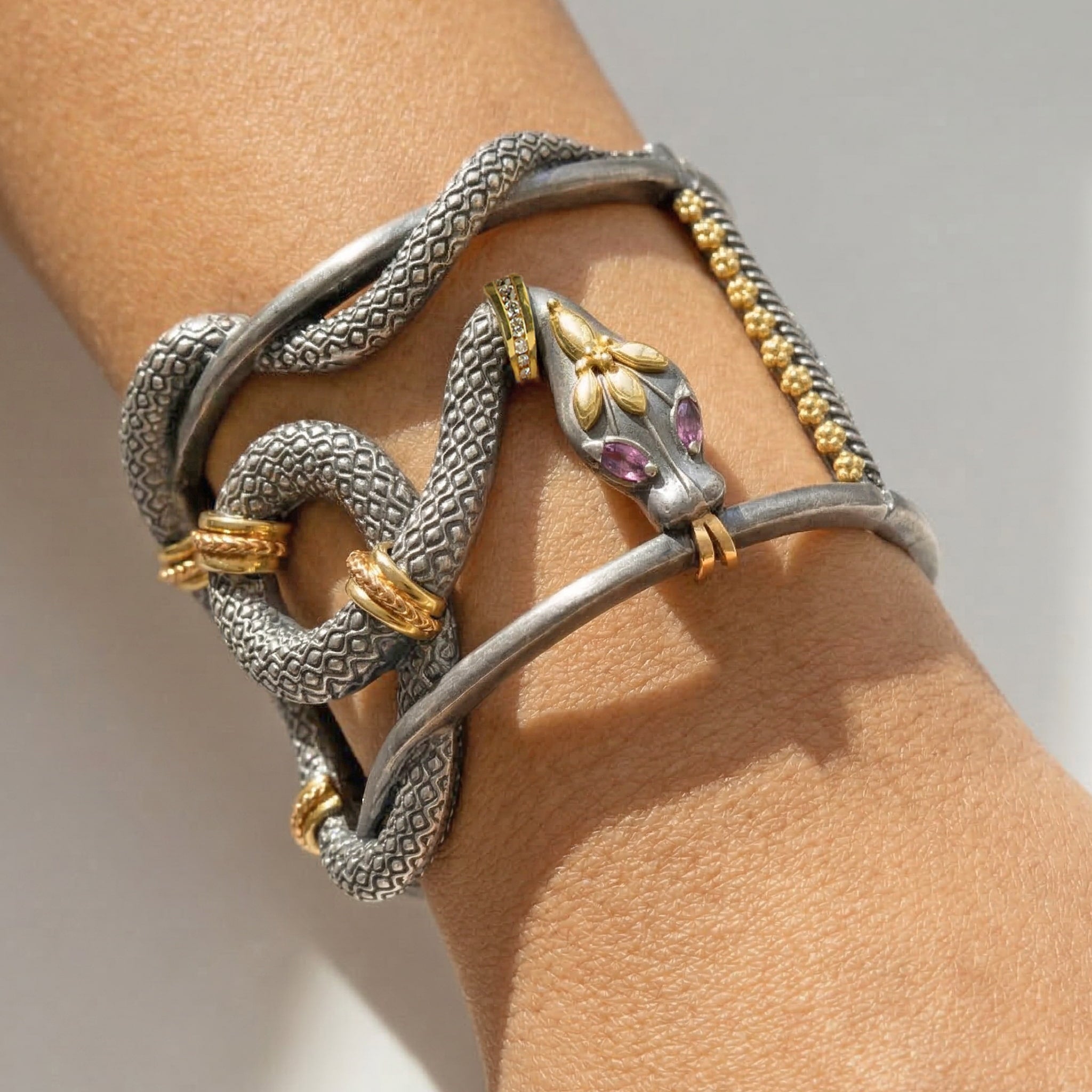 Stambolian Serpentine Aged Silver 18K Gold Cuff Close-Up Showing Serpent Heads with Pink Sapphire Eyes