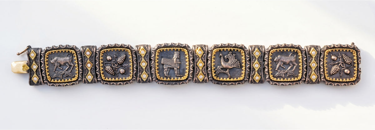 Erebuni aged silver and 18K gold diamond bracelet, laid flat showing all six panels, top-down view