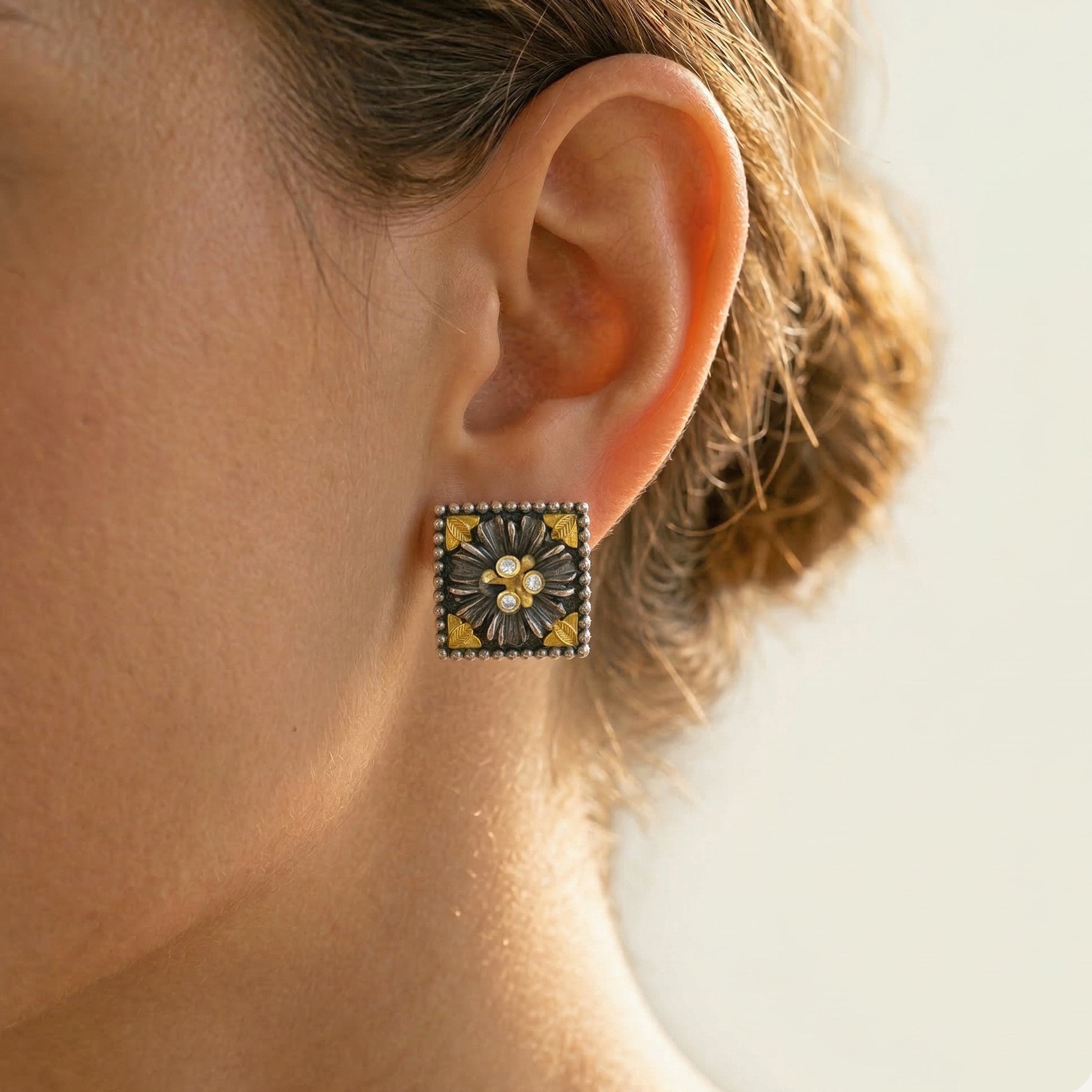 Stambolian Organza Aged Silver and 18K Gold Diamond Floral Stud Earrings on White Background
