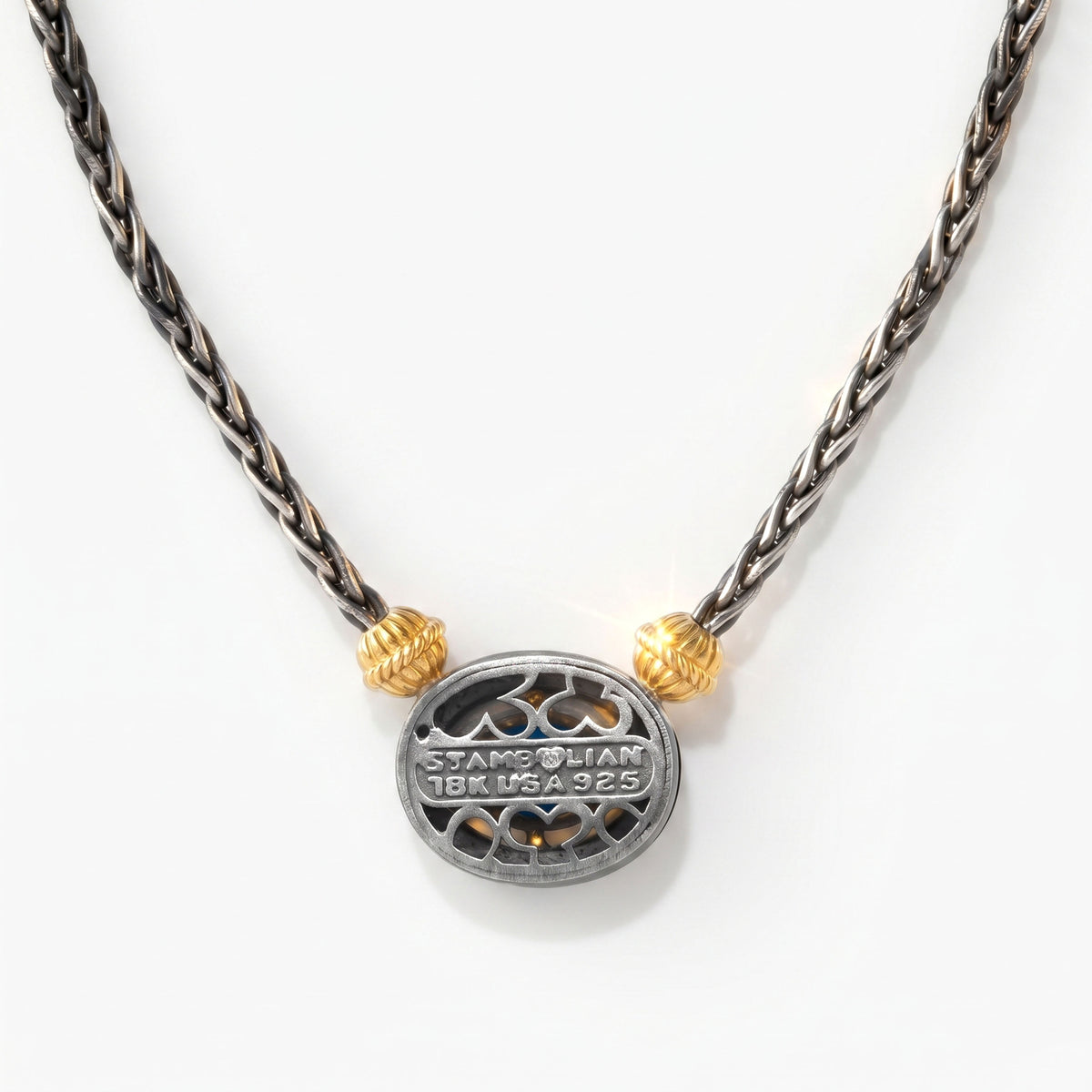 Beginnings aged silver and 18K gold coral pendant necklace, back view showing the hallmark stamp