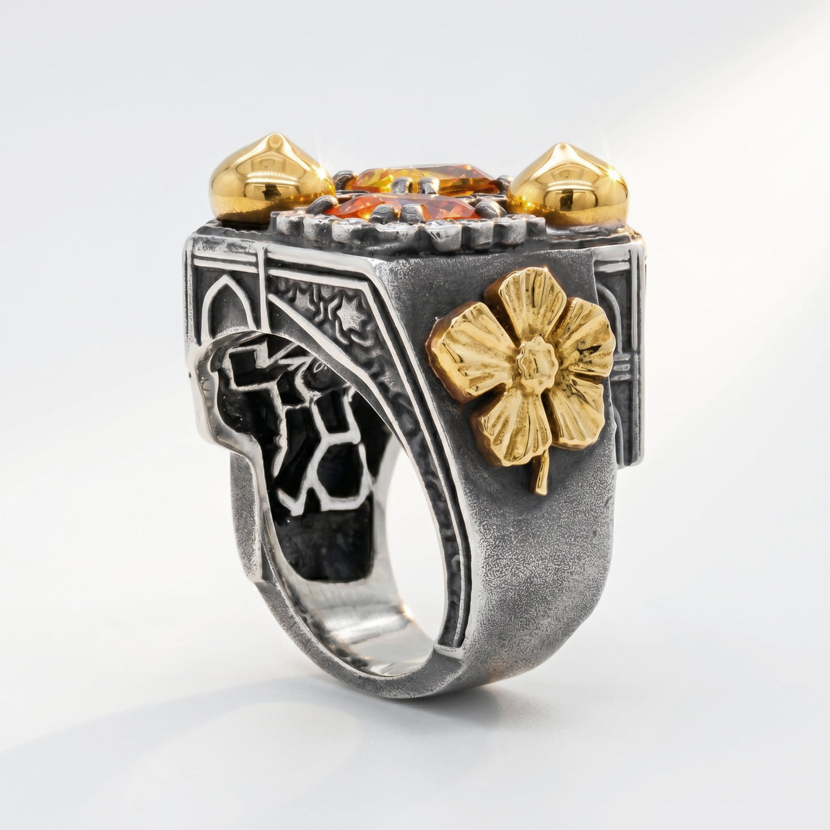 "Taj Mahal" ring in aged silver and 18K gold, opposite side view showing the gold flower and gemstones