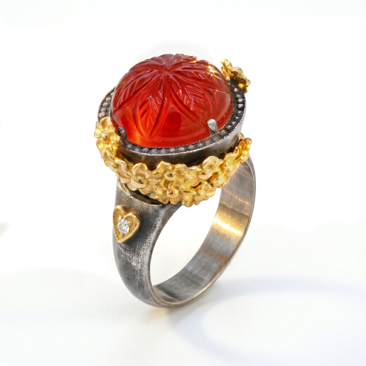 "Rose Garden" aged silver and 18K gold floral ring with carved carnelian, angled view