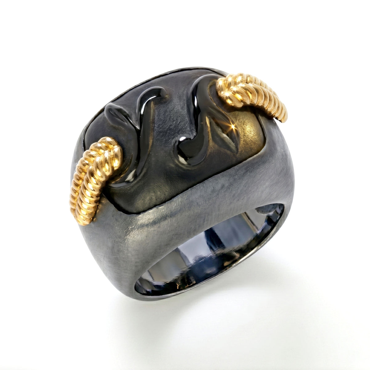 "Beginnings" ring in aged silver and 18K gold with frosted onyx center, angled view