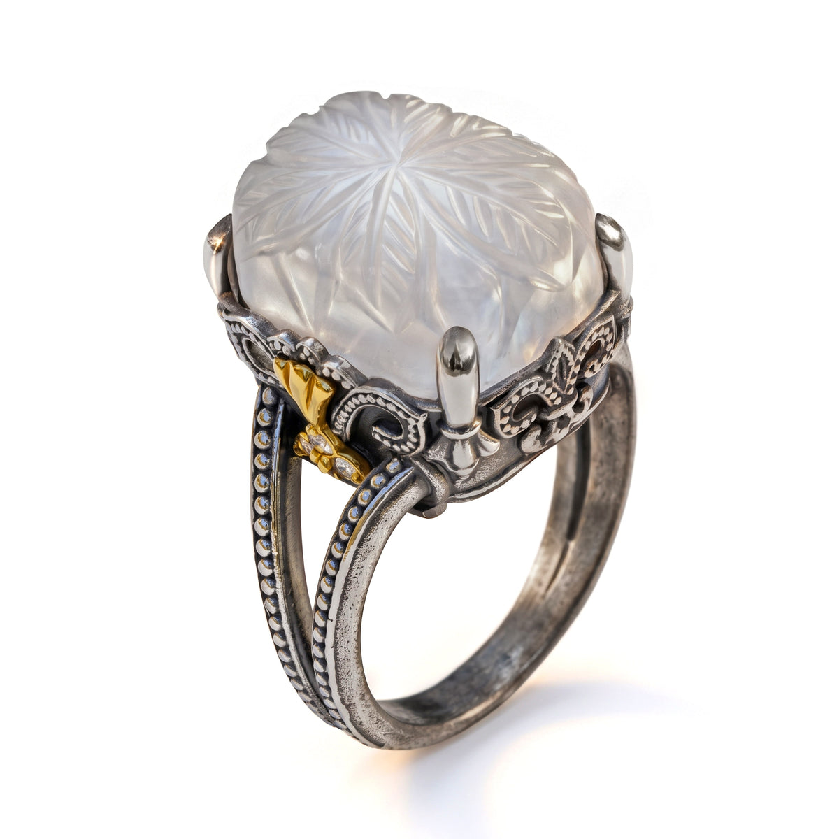 "Beginnings" carved white moonstone and diamond ring in aged silver and 18K gold, angled view