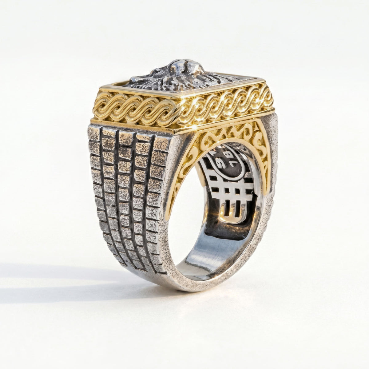 Lion Head men's ring in aged silver and 18K gold, side view of the textured shank